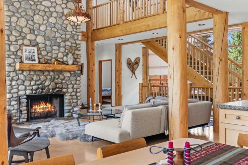 24 Blue Grouse Ridge, Canmore, AB - Indoor Photo Showing Living Room With Fireplace