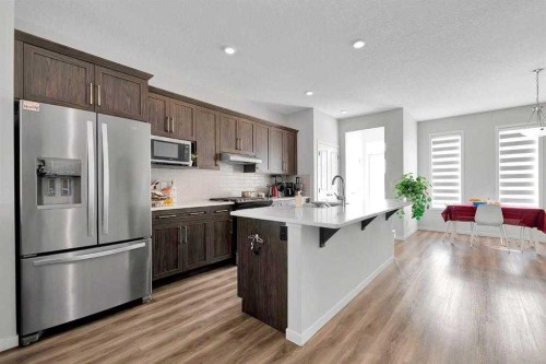 103 Dawson Harbour Hill, Chestermere, AB - Indoor Photo Showing Kitchen With Stainless Steel Kitchen With Upgraded Kitchen
