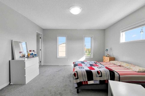 103 Dawson Harbour Hill, Chestermere, AB - Indoor Photo Showing Bedroom