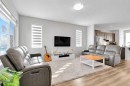 103 Dawson Harbour Hill, Chestermere, AB  - Indoor Photo Showing Living Room 