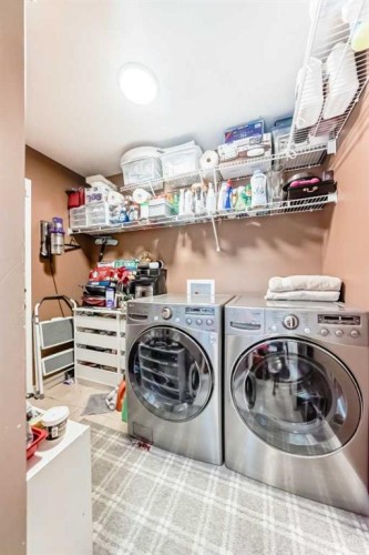 9834 Hidden Valley Drive Nw, Calgary, AB - Indoor Photo Showing Laundry Room