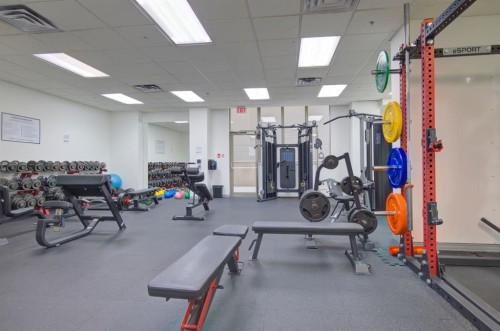 1406-683 10 Street Sw, Calgary, AB - Indoor Photo Showing Gym Room