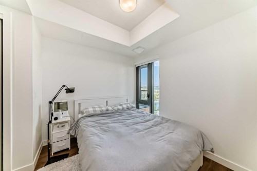1313-730 2, Calgary, AB - Indoor Photo Showing Bedroom
