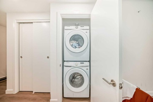1313-730 2, Calgary, AB - Indoor Photo Showing Laundry Room