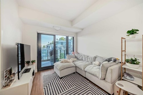 1313-730 2, Calgary, AB - Indoor Photo Showing Living Room