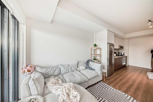 1313-730 2, Calgary, AB - Indoor Photo Showing Living Room