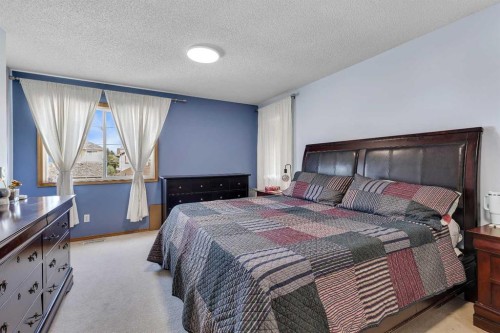 10913 Hidden Valley Drive Nw, Calgary, AB - Indoor Photo Showing Bedroom