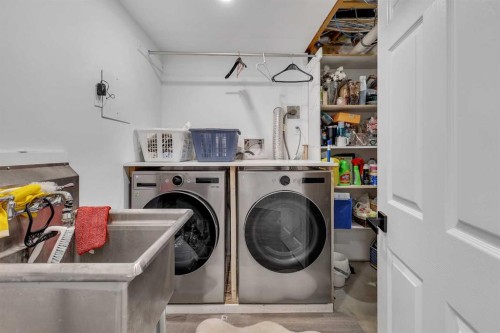 10913 Hidden Valley Drive Nw, Calgary, AB - Indoor Photo Showing Laundry Room