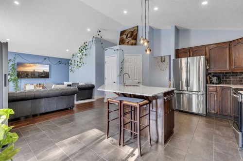 10913 Hidden Valley Drive Nw, Calgary, AB - Indoor Photo Showing Kitchen With Stainless Steel Kitchen