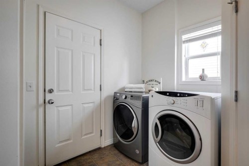 15 Copperfield Close Se, Calgary, AB - Indoor Photo Showing Laundry Room