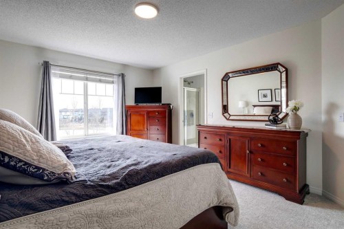 15 Copperfield Close Se, Calgary, AB - Indoor Photo Showing Bedroom