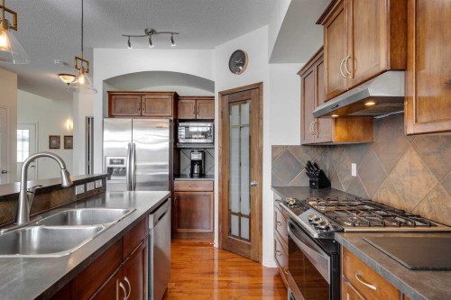 15 Copperfield Close Se, Calgary, AB - Indoor Photo Showing Kitchen With Double Sink With Upgraded Kitchen