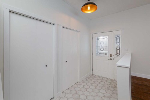 256 Queen Tamara Way Se, Calgary, AB - Indoor Photo Showing Other Room