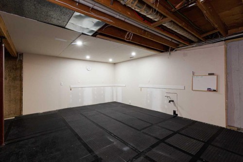 256 Queen Tamara Way Se, Calgary, AB - Indoor Photo Showing Basement