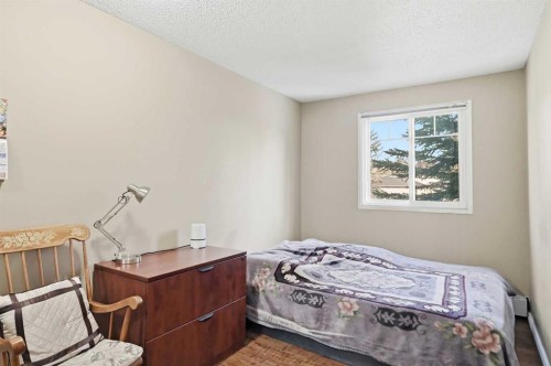301C-5601 Dalton Drive Nw, Calgary, AB - Indoor Photo Showing Bedroom
