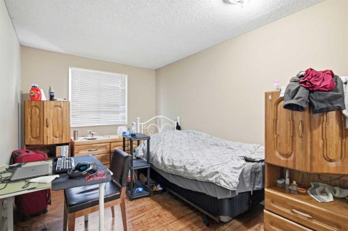301C-5601 Dalton Drive Nw, Calgary, AB - Indoor Photo Showing Bedroom