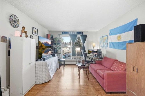 301C-5601 Dalton Drive Nw, Calgary, AB - Indoor Photo Showing Living Room