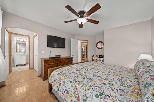 113 Sheep River Drive, Okotoks, AB - Indoor Photo Showing Bedroom