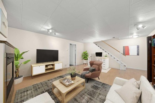 113 Sheep River Drive, Okotoks, AB - Indoor Photo Showing Other Room