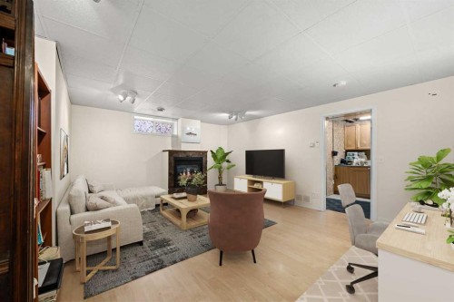 113 Sheep River Drive, Okotoks, AB - Indoor With Fireplace