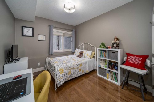 116-77 George Fox Trail, Cochrane, AB - Indoor Photo Showing Bedroom