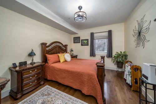 116-77 George Fox Trail, Cochrane, AB - Indoor Photo Showing Bedroom
