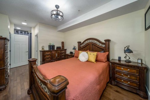 116-77 George Fox Trail, Cochrane, AB - Indoor Photo Showing Bedroom