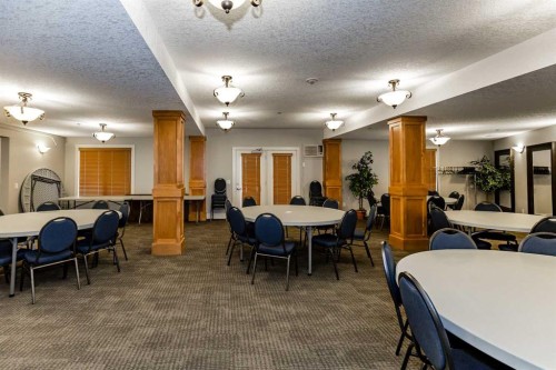 116-77 George Fox Trail, Cochrane, AB - Indoor Photo Showing Dining Room