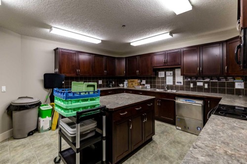 116-77 George Fox Trail, Cochrane, AB - Indoor Photo Showing Kitchen