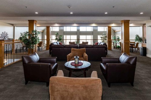 116-77 George Fox Trail, Cochrane, AB - Indoor Photo Showing Living Room