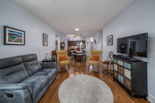 116-77 George Fox Trail, Cochrane, AB - Indoor Photo Showing Living Room