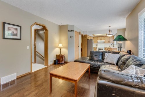 212 Mckerrell Way Se, Calgary, AB - Indoor Photo Showing Living Room