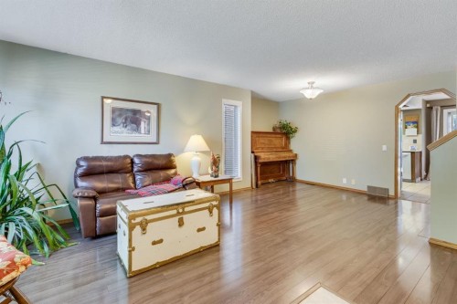 212 Mckerrell Way Se, Calgary, AB - Indoor Photo Showing Living Room