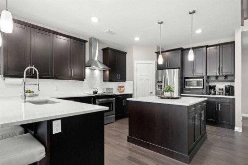 555 Summer Crescent, Rural Ponoka County, AB - Indoor Photo Showing Kitchen With Upgraded Kitchen