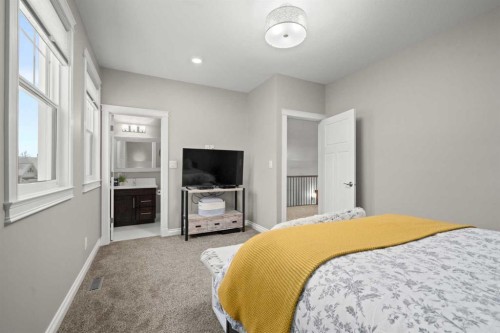 555 Summer Crescent, Rural Ponoka County, AB - Indoor Photo Showing Bedroom