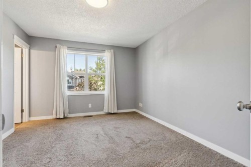 117 Tuscany Drive Nw, Calgary, AB - Indoor Photo Showing Other Room