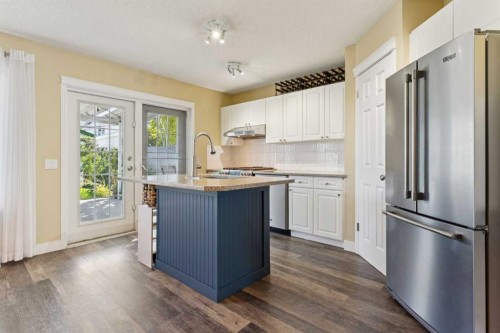 117 Tuscany Drive Nw, Calgary, AB - Indoor Photo Showing Kitchen With Stainless Steel Kitchen With Upgraded Kitchen
