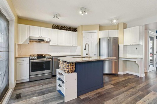 117 Tuscany Drive Nw, Calgary, AB - Indoor Photo Showing Kitchen With Stainless Steel Kitchen With Upgraded Kitchen