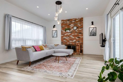 820 Cantrell Place Sw, Calgary, AB - Indoor Photo Showing Living Room