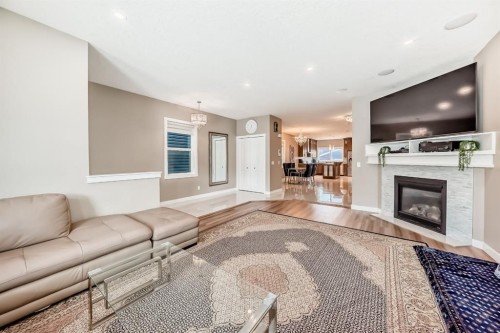 36 Red Embers Row Ne, Calgary, AB - Indoor Photo Showing Living Room With Fireplace