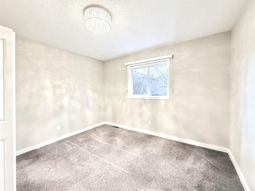 161 Springbank Place Sw, Calgary, AB - Indoor Photo Showing Other Room