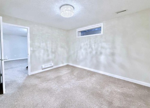 161 Springbank Place Sw, Calgary, AB - Indoor Photo Showing Other Room