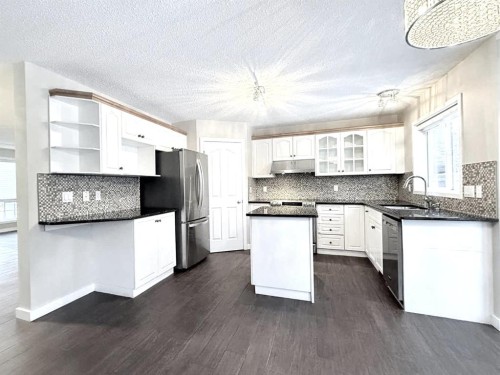 161 Springbank Place Sw, Calgary, AB - Indoor Photo Showing Kitchen With Upgraded Kitchen