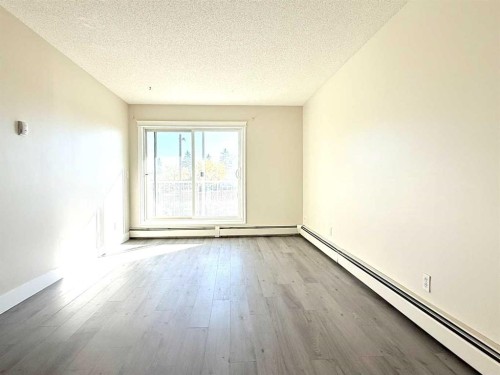 207-5555 Falsbridge Drive Ne, Calgary, AB - Indoor Photo Showing Other Room