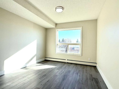 207-5555 Falsbridge Drive Ne, Calgary, AB - Indoor Photo Showing Other Room