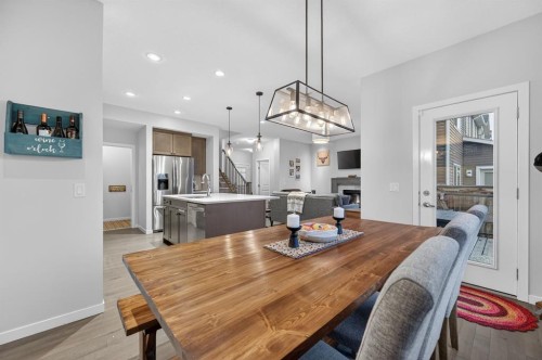 73 Fireside Cove, Cochrane, AB - Indoor Photo Showing Dining Room