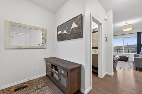 73 Fireside Cove, Cochrane, AB - Indoor Photo Showing Other Room