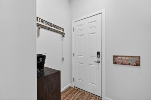 73 Fireside Cove, Cochrane, AB - Indoor Photo Showing Other Room