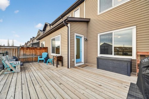 73 Fireside Cove, Cochrane, AB - Outdoor With Deck Patio Veranda With Exterior