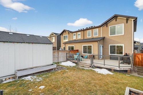 73 Fireside Cove, Cochrane, AB - Outdoor With Exterior